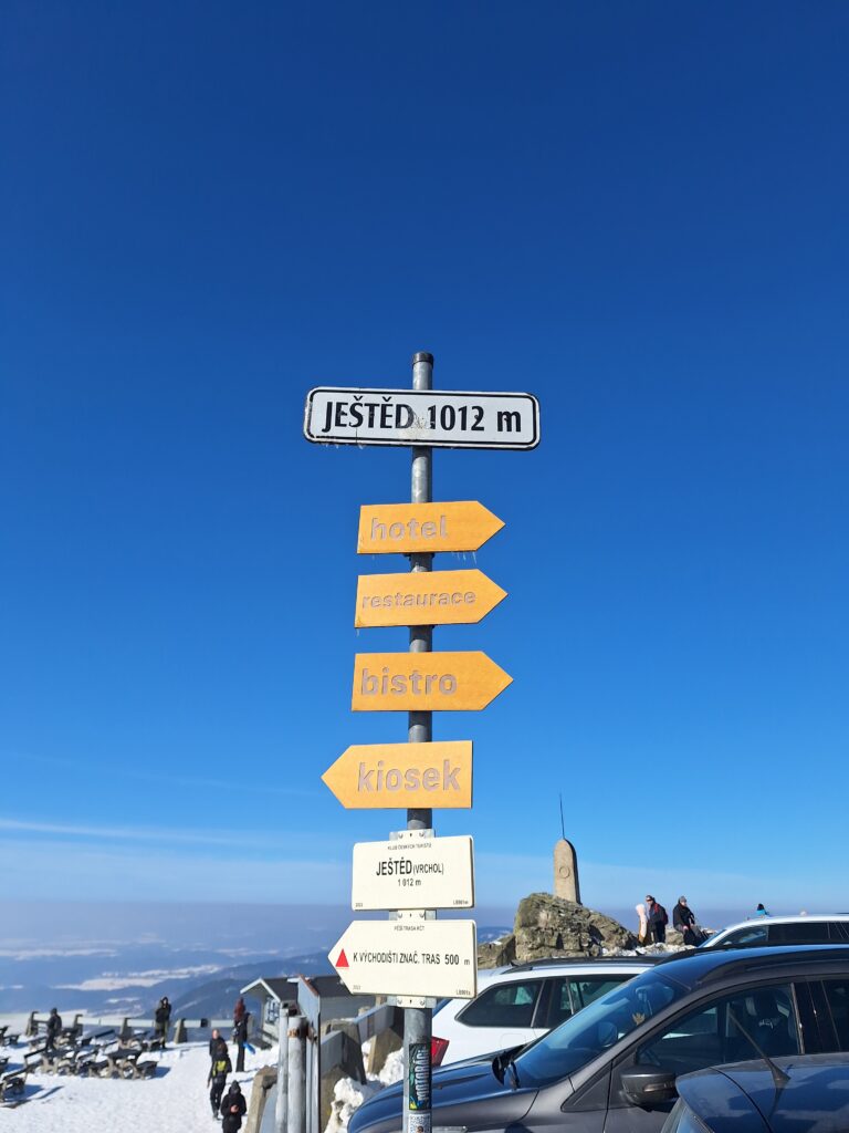 sign pole at the top of Ještěd