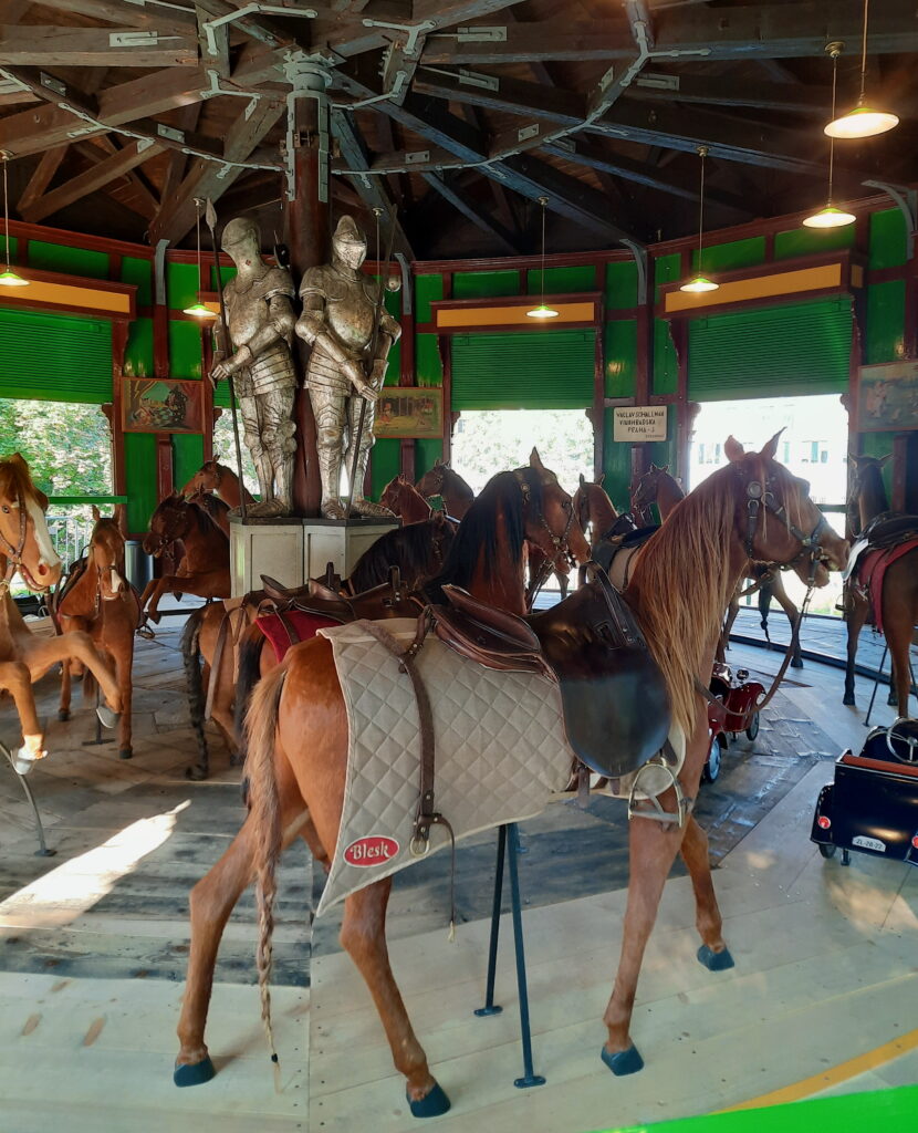 Interior of the carousel with horses