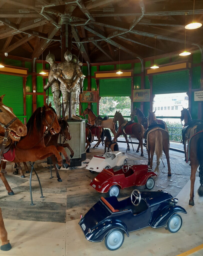 Interior of the carousel with tiny cars