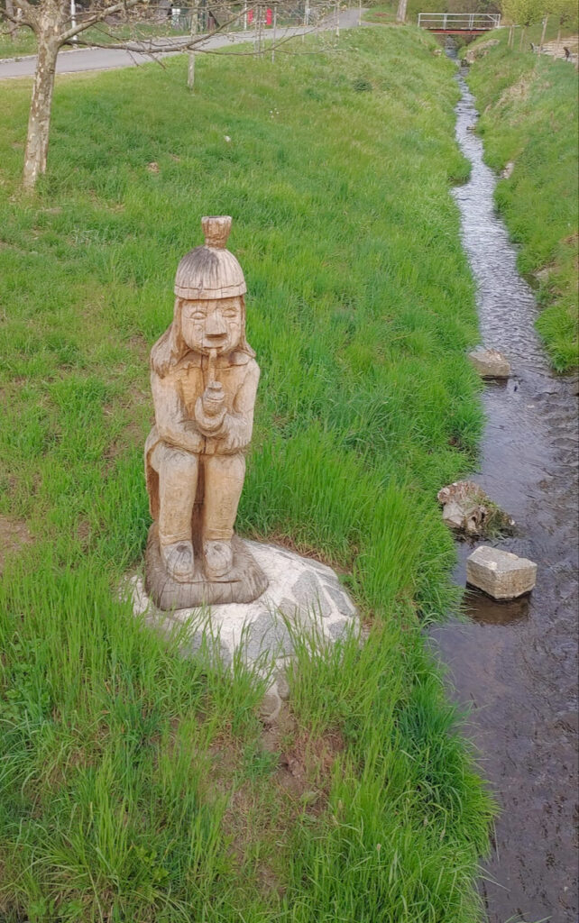 Wooden Vodník smoking a pipe
