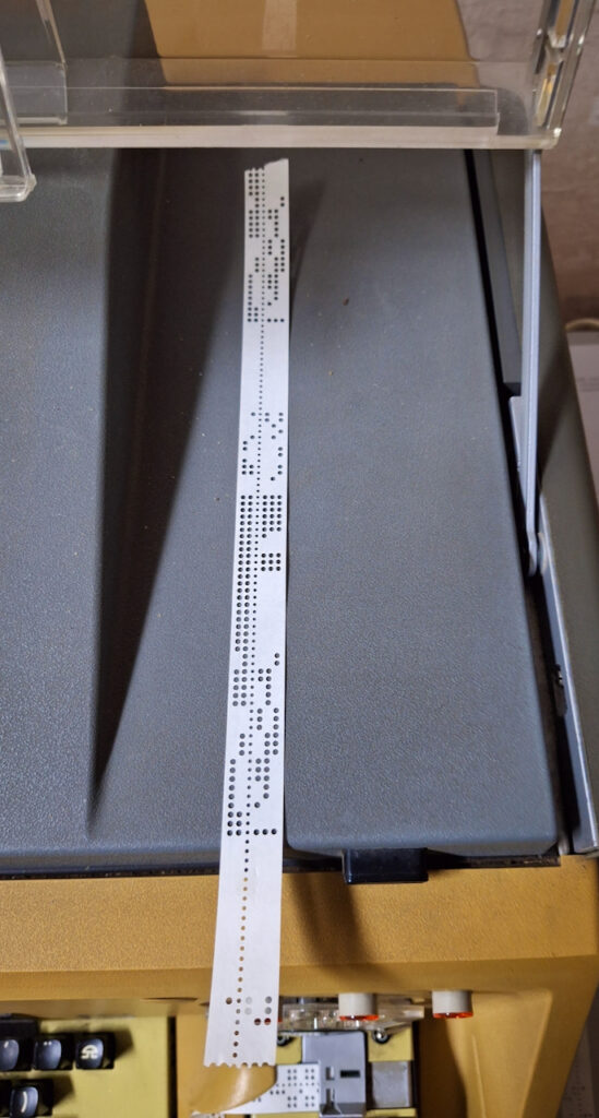 Perforated card for telex